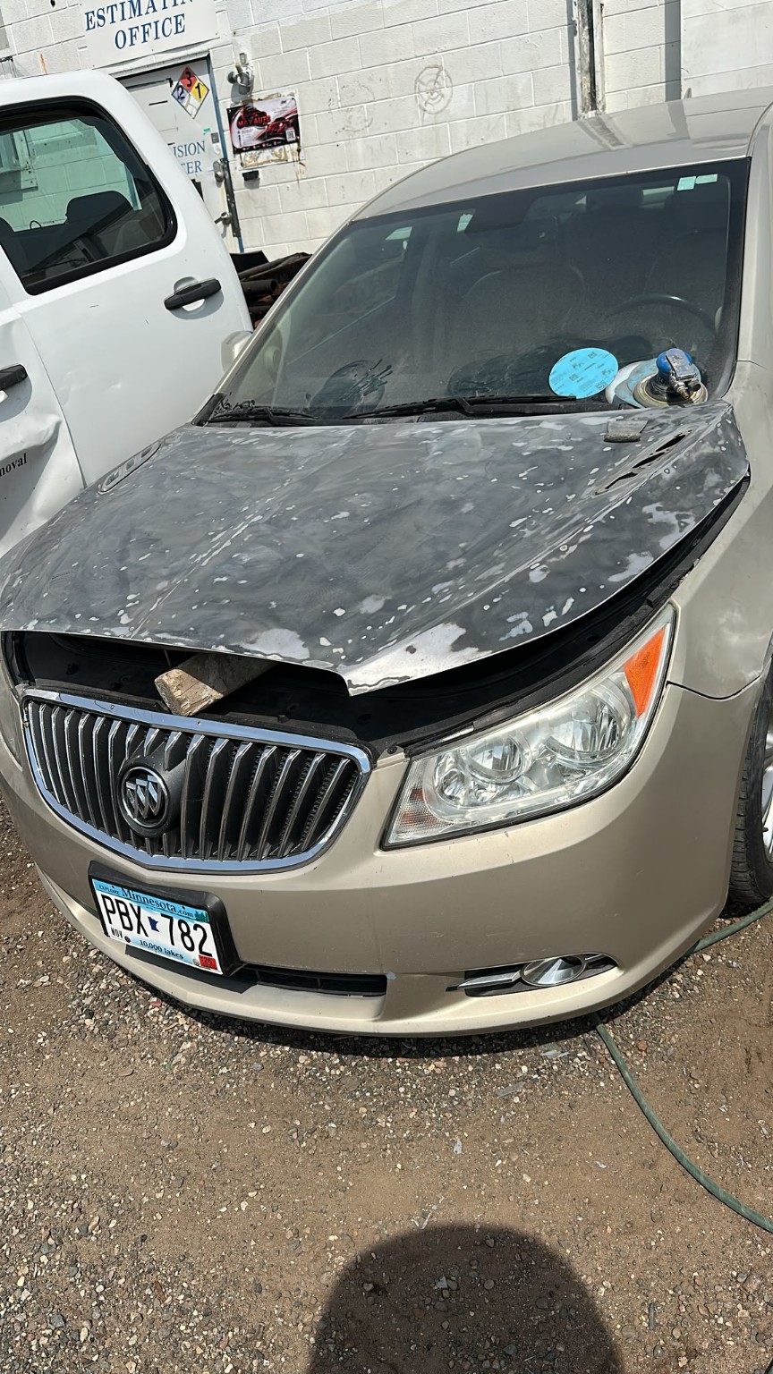 Buick hood during bodywork before refinishing